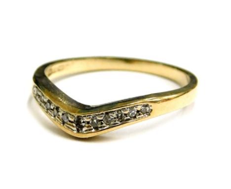 A 9ct gold dress ring, of wishbone design, set with tiny diamonds in platinum setting, ring size K, 1.4g all in.