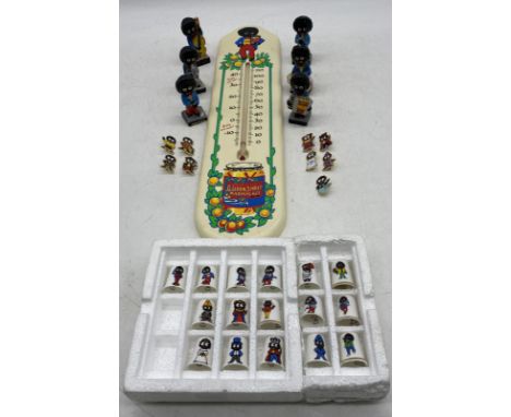 A collection of Robertson "Golly" advertising items including a thermometer, band, badges etc. These items are listed on the 