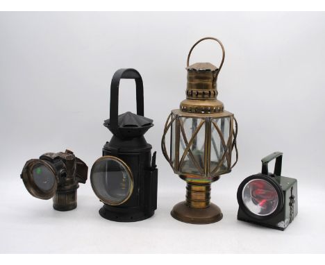 A Railway lamp marked 'C Eastgate & Son Ltd, 1945, Birmingham' with broad arrow mark, along with two carriage lamps and one o