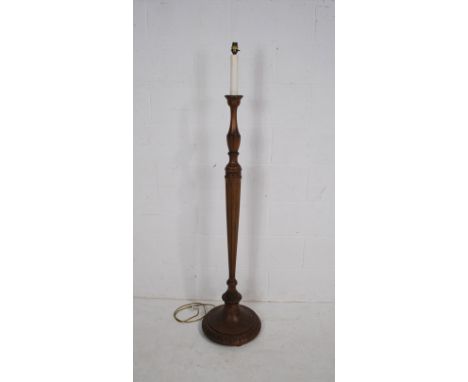 A carved mahogany standard lamp - height 158cm