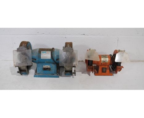 A Wolf 200mm bench grinder, along with a Black Spur 150mm bench grinder
