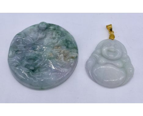 Three carved jade pendants, one in the form of a Buddha, a jade disc carved with a dragon and one other