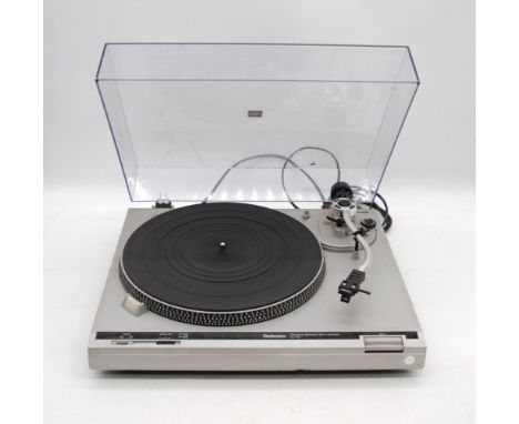 A vintage Technics SL-B2 belt drive turntable, with Pioneer head shell with R-100 stylus