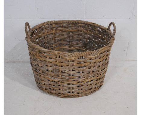A large vintage wicker basket