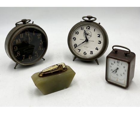 A collection of vintage alarm clocks including Thomas Russell & Sons along with an onyx Ronson lighter 
