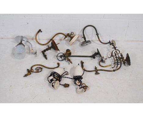 A quantity of various vintage metal wall light fittings, along with a pair of rise-and-fall ceiling light fittings
