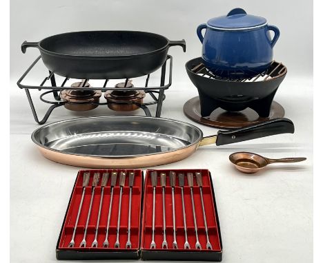 A vintage Le Creuset fondue set, pan, forks etc
