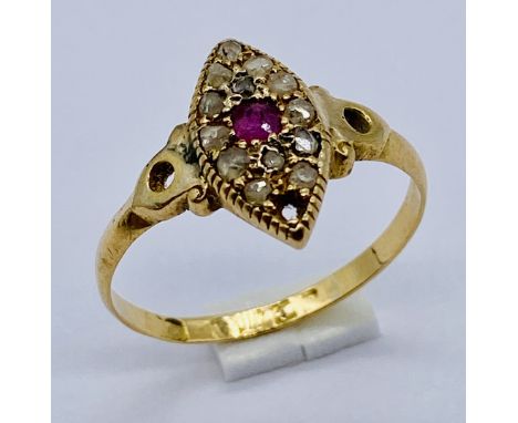 An 18ct gold ring set with diamonds around a central ruby- 1 diamond missing, total weight 3g, size Q