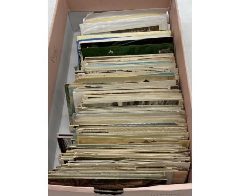 A collection of vintage postcards including some of local interest