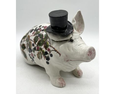 A large Wemyss pig with top hat decorated in bramble and blackberry pattern, signed to the underside 'Wemyss, EXON 1899, B. A