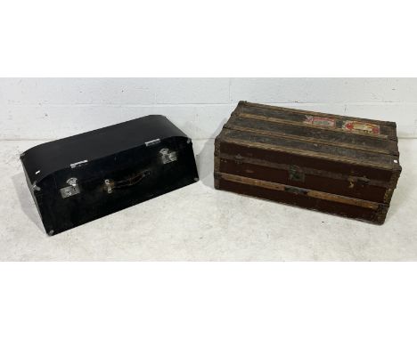 A vintage steamer trunk with numerous labels for Cunard White Star Line, Canadian Pacific, British Railways etc. along with a