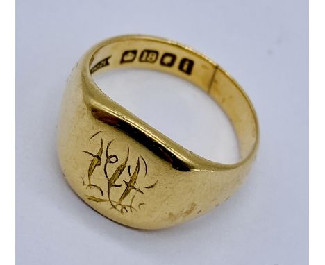 An 18ct gold signet ring, weight 7.6g, size K 1/2