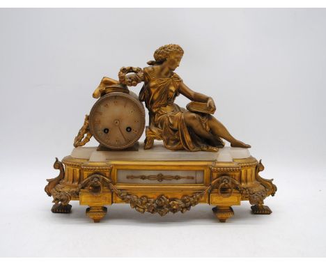 A French Classical style gilded and marble mantel clock, with key