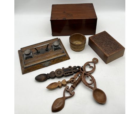 A collection of various items including felt lined wooden box, inkwell stand, love spoons etc. 