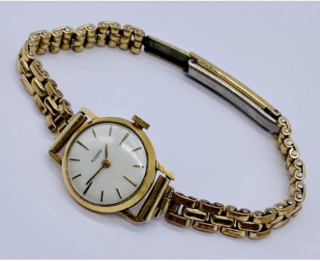 A ladies 9ct gold Rotary wristwatch on rolled gold strap