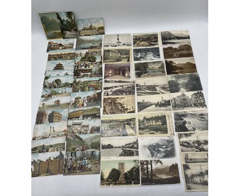 A collection of vintage postcards including Royal Navy