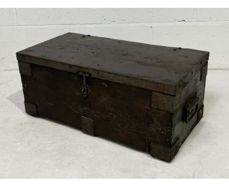 A vintage wooden metal bound tool trunk
