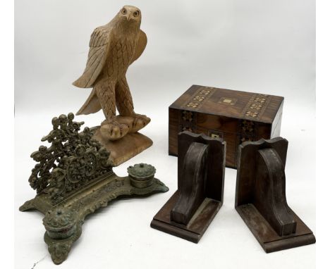 A collection of items including ornate brass inkwell, carved eagle, marquetry box etc. 