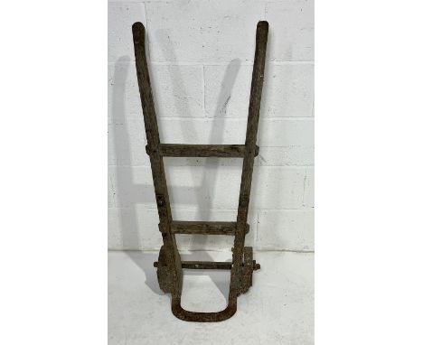A set of vintage wooden sack trucks, possibly Railway related.