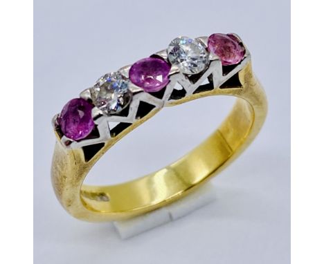 An 18ct gold ruby and diamond 5 stone ring, weight 6.1g, size M