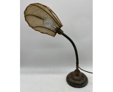 A turn of the century adjustable copper table lamp 