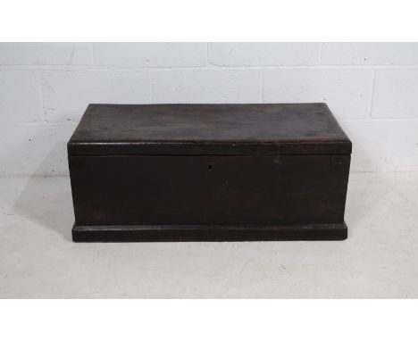 An antique metal-bound wooden storage trunk - length 95cm, depth 44cm, height 37cm