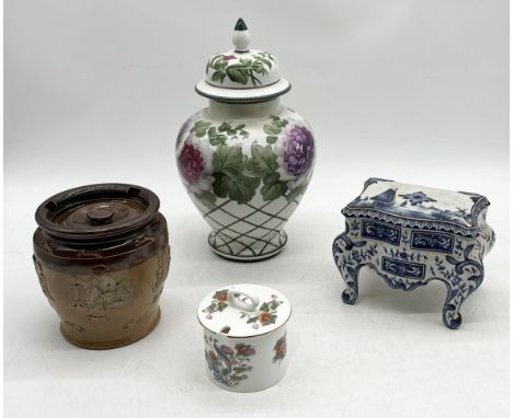 A collection of china including Royal Doulton, Royal Bonn vase, Delft style model of a commode etc. 