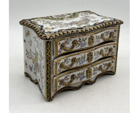 A 19th century Faience hand painted serpentine fronted commode chest of drawers/jewellery box with three drawers