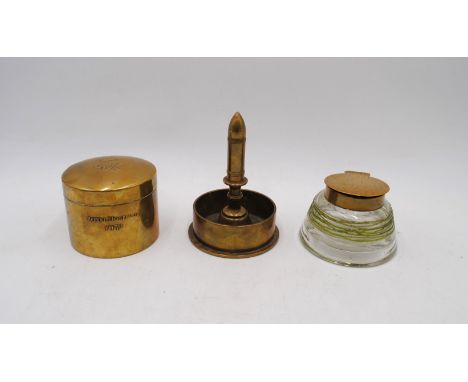 A trench art brass dish formed from the base of a bomb shell, along with a brass pot marked 'Royal Hospital 1937' and a glass