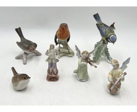 A collection of ceramics including Goebel birds, continental cherubs etc.
