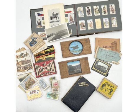 A collection of various items including cigarette cards, magic lantern slides, autograph book, pictures etc.