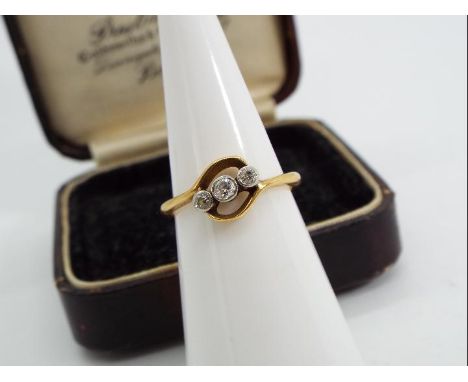 18ct gold - a 18ct gold trilogy ring set with  old cut crossover diamonds, stamped 18 ct, size I, approx weight 2.19g