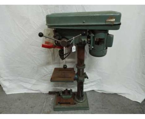 A Nu-Tool 12 speed drill press.