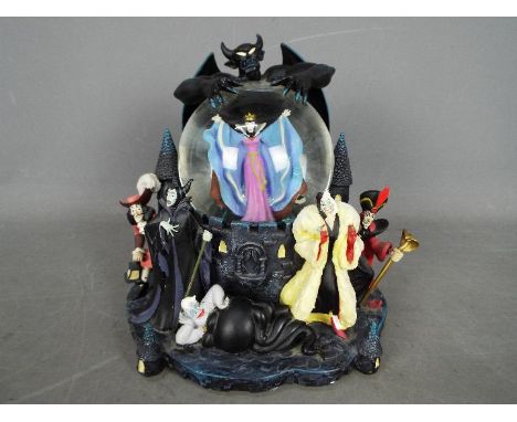 A large Disney 'Villains' snow globe depicting the antagonists from various Disney films, approximately 22 cm (h)