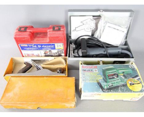 Lot to include a Bosch orbital sander, an Elu flat dowel joiner, drill bit sharpener and Stanley plane.