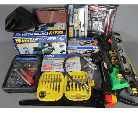 Lot to include an electric planer, 3" cut off tool, soldering iron, bench morticer chisel set and similar. 