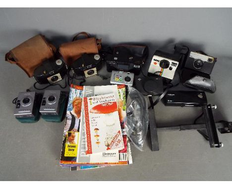 Photography - A collection of cameras to include Polaroid, Kodak, Chinon and other.