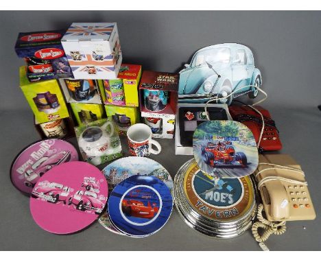 A mixed lot to include ceramics, vintage telephones, wall clocks and similar. [2]