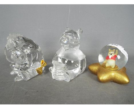 Two lead crystal, Disney, Winnie The Pooh figures by Lenox comprising Winnie The Pooh with Honeypot and Eeyore, largest appro