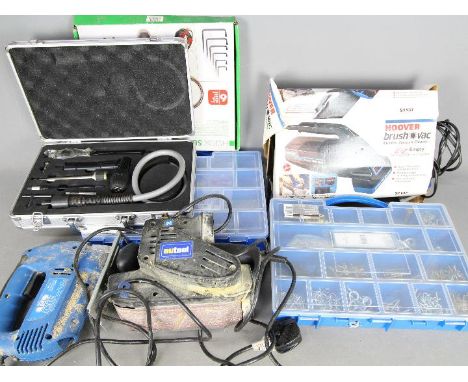 Lot to include a belt sander, jigsaw, hand held vacuum cleaner and similar.