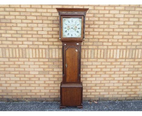 A late 18th century oak and mahogany cased 8-day longcase clock, 13 inch Wilson painted dial, floral decoration to the corner