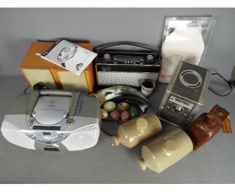 Lot to include an LG micro stereo system and speakers, Philips stereo, vintage Roberts R707 radio and other. [2]