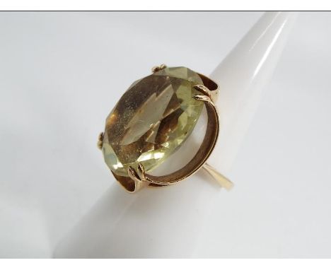 9ct gold - a 9ct gold stone set ring, stone 2 cm x 1.5 cm, stamped 375, size L, approx weight 7.26g