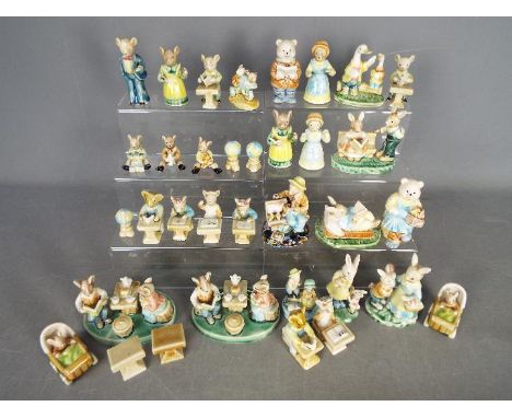 A collection of Golden Rose Giftware ceramic figurines of mice and bears.