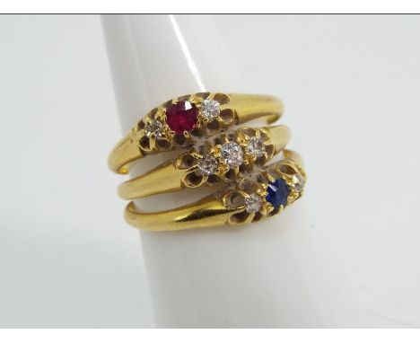 18ct gold - a 18 ct gold stone set triple ring, size L½, approx weight 5.58 g 