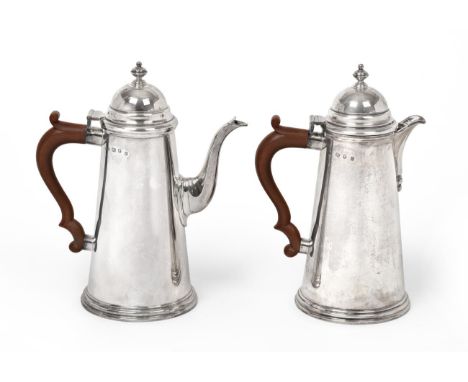 An Elizabeth II Silver Coffee-Pot and Hot-Water Jug, by Prestons Ltd., London, 1969, each in the George I style, tapering cyl