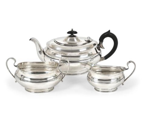 A Three-Piece George V Silver Tea-Service, by Sydney Hall and Co., Sheffield, 1932, each piece oval and on collet foot, engra