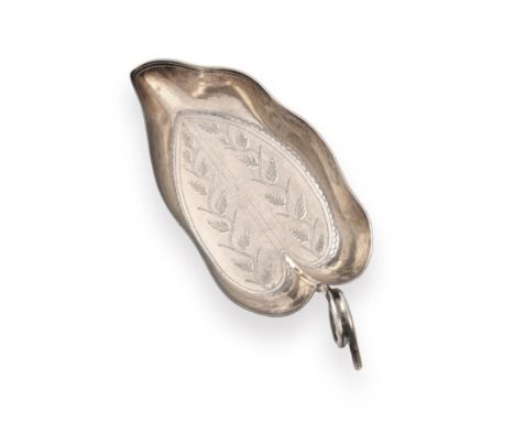A George III Silver Caddy-Spoon, by Joseph Willmore, Birmingham, 1807, leaf-shaped and with scroll handle, engraved with foli