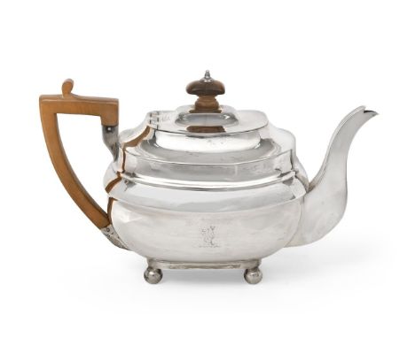 A George III Provincial Silver Teapot, by Dorothy Langlands, Newcastle, 1808, oblong and on four ball feet, the hinged cover 