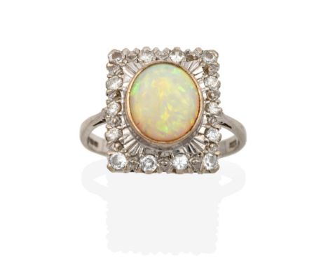 An 18 Carat White Gold Opal and Diamond Cluster Ring, the plaque set throughout with eight-cut diamonds and an oval cabochon 